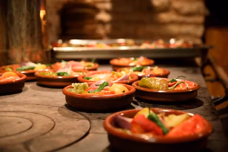 Verduras ecológicas preparadas en horno de leña.