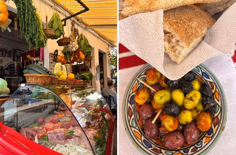 Expositor de productos del Chez Hassan y aceitunas aliñadas sobre cerámica artesanal.