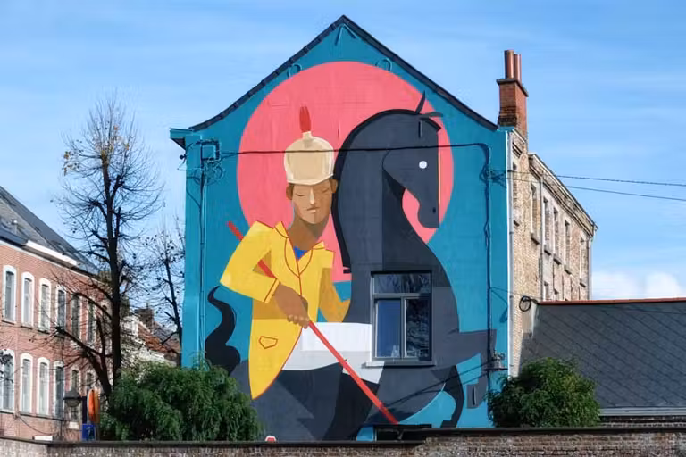 San Jorge y el Dragón en una pared de Mons